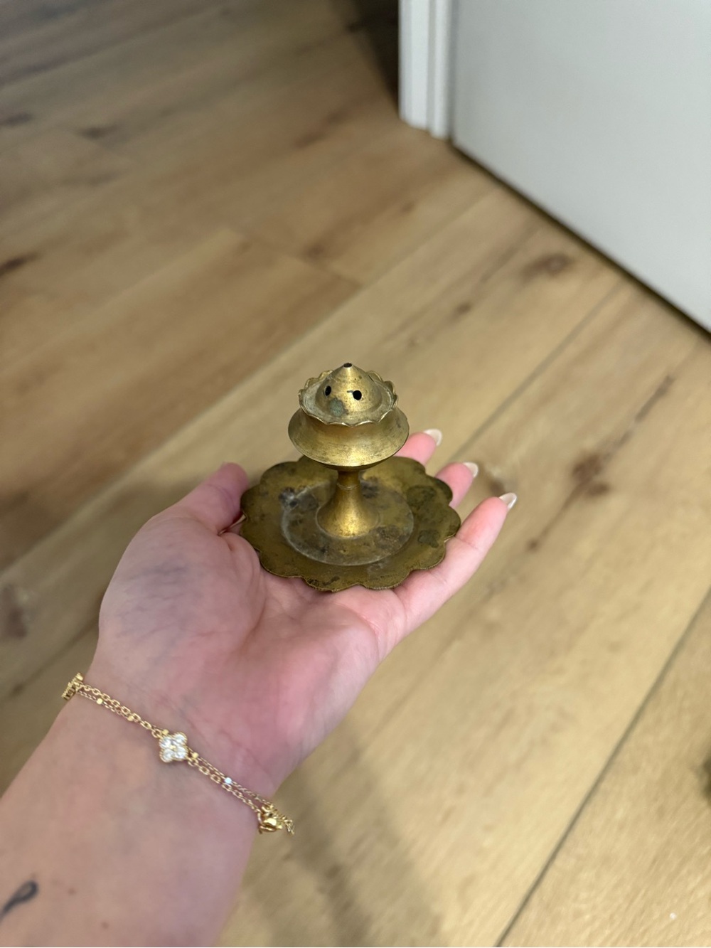 Brass incense burner with floral bottom